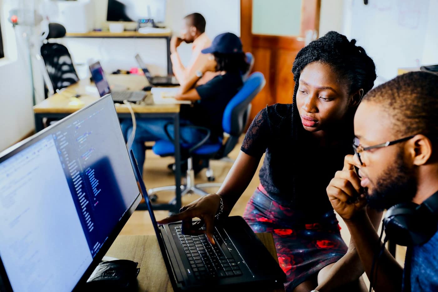 Developers reviewing code together